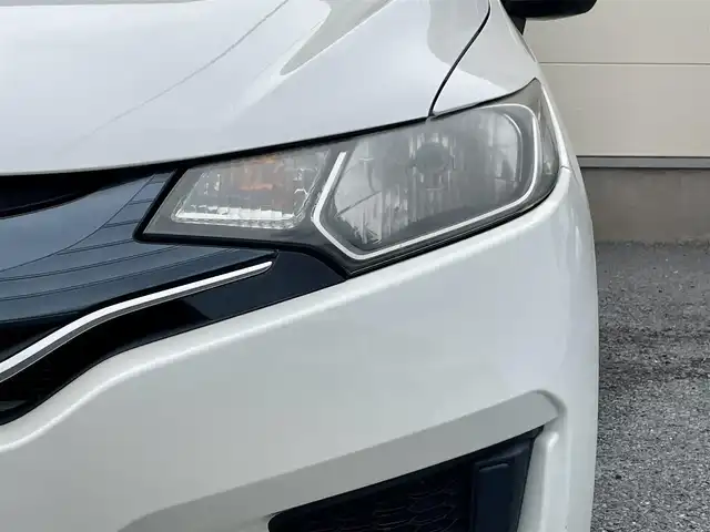 ホンダ フィット 13G Lパッケージ 茨城県 2015(平27)年 4.6万km プレミアムホワイトパール 純正ナビ（VXM-155C）/バックカメラ/社外前ドラレコ（SN-TW9880）/スペアキー/レベライザー/アイドリングストップ/純正マット/社外ETC