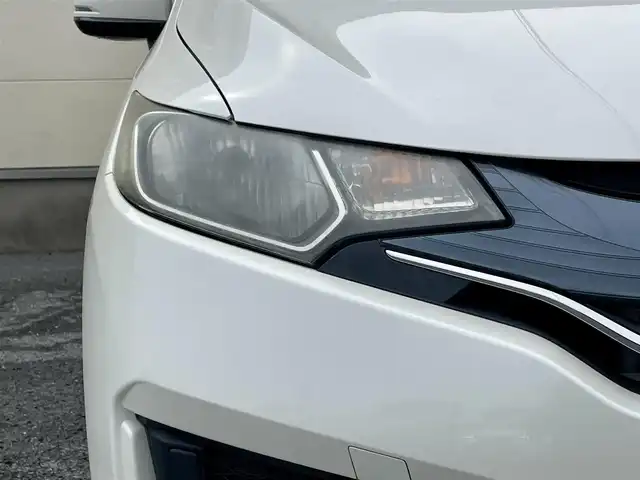 ホンダ フィット 13G Lパッケージ 茨城県 2015(平27)年 4.6万km プレミアムホワイトパール 純正ナビ（VXM-155C）/バックカメラ/社外前ドラレコ（SN-TW9880）/スペアキー/レベライザー/アイドリングストップ/純正マット/社外ETC