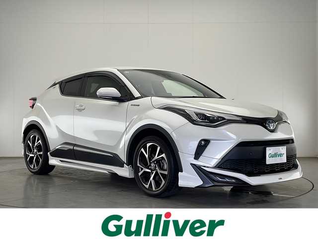 トヨタ Ｃ－ＨＲ G 宮崎県 2019(令1)年 3.8万km ホワイトパールクリスタルシャイン 禁煙車/トヨタセーフティセンス/純正8型ディスプレイオーディオ/（T-CONNECT/FMAM/Bluetooth/ナビ）/純正バックカメラ/純正ビルトインETC/純正モデリスタエアロ/純正18インチアルミ/純正LEDオートライト/純正LEDフォグ/純正フロアマット/アダプティブクルーズコントロール/プリクラッシュセーフティ/レーンディパーチャーアラート/オートマチックハイビーム/ブラインドスポットモニター/デュアルオートエアコン/ハーフレザーシート/スマートキー/プッシュエンジンスタート/新車時保証書/取扱い説明書