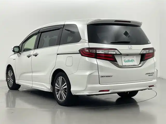 ホンダ オデッセイ ハイブリッド アブソルート ホンダセンシング 熊本県 2018(平30)年 8.2万km プラチナホワイトパール 純正ナビ（ＣＤ・ＤＶＤ・フルセグ・ＢＴ・ＳＤ・ｉｐｏｄ・HDMI）/バックカメラ　/純正前方ドライブレコーダー　/ビルトインＥＴＣ2.0　/両側パワースライドドア　/ホンダセンシング/・衝突軽減ブレーキ/・レーダークルーズコントロール/・先行車発進お知らせ機能/・路外逸脱制御機能/・レーンキープアシスト/・標識認識機能/横滑り防止/運転席パワーシート/ハーフレザーシート/純正フロアマット/純正１７インチAW/オートライト/LEDヘッドライト/フォグライト/スマートキー/プッシュスタート/保証書/取扱説明書