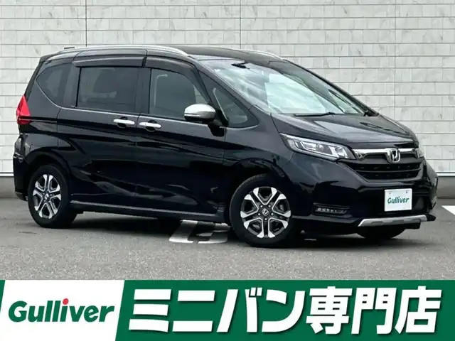 ホンダ フリード クロスター ホンダセンシング 福岡県 2022(令4)年 2.1万km クリスタルブラックパール 純正9型SDナビ(フルセグTV/CD/DVD/BT)フリップダウンモニターバックモニターホンダセンシングコーナーセンサーレーダークルコン両側パワスラ前後ドラレコETCUSBポート純正フロアマット純正LEDヘッドライト純正アルミホイール15インチスマートキープッシュスタート