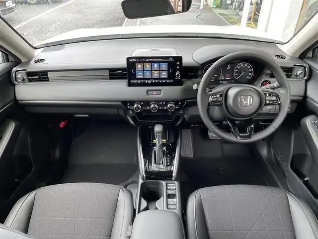 ホンダ ヴェゼル ハイブリッド e:HEV Z 東京都 2025(令7)年 0.1千km プラチナホワイトパール 登録済未使用車/純正ナビ/置型充電/BSM/ETC2.0/レーダークルーズコントロール/18インチ純正ホイール/純正LED/電動リアケート/シートヒーター/衝突被害軽減ブレーキ/盗難防止装置