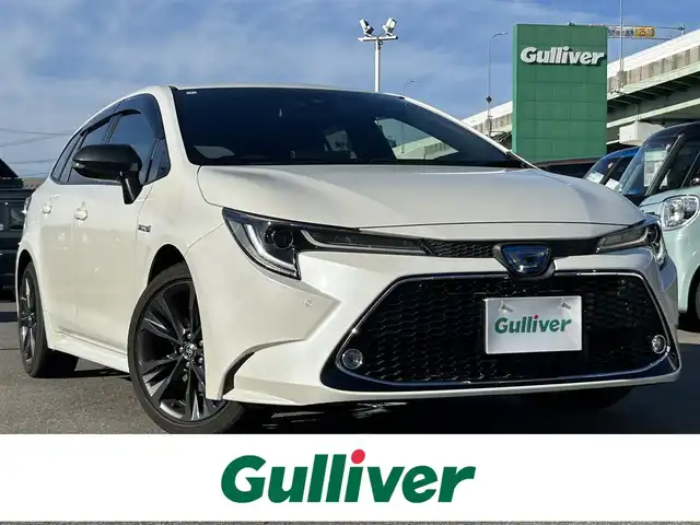 トヨタ カローラツーリング ハイブリッド ダブルバイビー 愛知県 2020(令2)年 2.5万km ホワイトパールクリスタルシャイン ＤＡ９インチナビ　/Ｂカメラ　/ＥＴＣ　/ＢＴ　/ＵＳＢ　/衝突軽減ブレーキ　/クリアランスソナー　/ステアリングスイッチ　/ＬＥＤヘッドライト　/置くだけ充電　/ＡＣ１００Ｖ　/Ｆドラレコ　/純正１７インチＡＷ