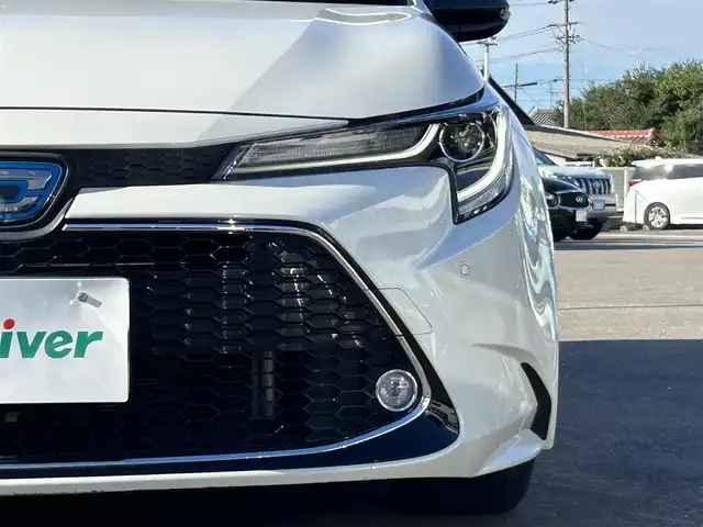 トヨタ カローラツーリング ハイブリッド ダブルバイビー 愛知県 2020(令2)年 2.5万km ホワイトパールクリスタルシャイン ＤＡ９インチナビ　/Ｂカメラ　/ＥＴＣ　/ＢＴ　/ＵＳＢ　/衝突軽減ブレーキ　/クリアランスソナー　/ステアリングスイッチ　/ＬＥＤヘッドライト　/置くだけ充電　/ＡＣ１００Ｖ　/Ｆドラレコ　/純正１７インチＡＷ