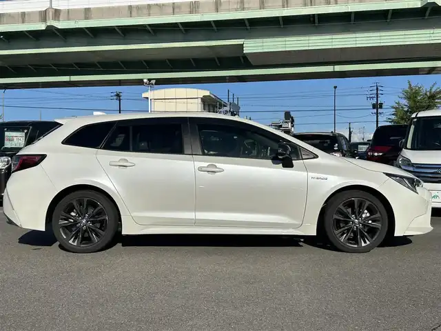 トヨタ カローラツーリング ハイブリッド ダブルバイビー 愛知県 2020(令2)年 2.5万km ホワイトパールクリスタルシャイン ＤＡ９インチナビ　/Ｂカメラ　/ＥＴＣ　/ＢＴ　/ＵＳＢ　/衝突軽減ブレーキ　/クリアランスソナー　/ステアリングスイッチ　/ＬＥＤヘッドライト　/置くだけ充電　/ＡＣ１００Ｖ　/Ｆドラレコ　/純正１７インチＡＷ