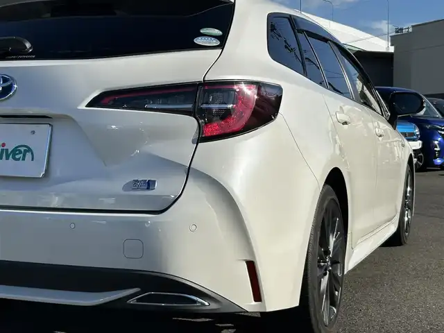トヨタ カローラツーリング ハイブリッド ダブルバイビー 愛知県 2020(令2)年 2.5万km ホワイトパールクリスタルシャイン ＤＡ９インチナビ　/Ｂカメラ　/ＥＴＣ　/ＢＴ　/ＵＳＢ　/衝突軽減ブレーキ　/クリアランスソナー　/ステアリングスイッチ　/ＬＥＤヘッドライト　/置くだけ充電　/ＡＣ１００Ｖ　/Ｆドラレコ　/純正１７インチＡＷ