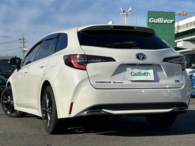 トヨタ カローラツーリング ハイブリッド ダブルバイビー 愛知県 2020(令2)年 2.5万km ホワイトパールクリスタルシャイン ＤＡ９インチナビ　/Ｂカメラ　/ＥＴＣ　/ＢＴ　/ＵＳＢ　/衝突軽減ブレーキ　/クリアランスソナー　/ステアリングスイッチ　/ＬＥＤヘッドライト　/置くだけ充電　/ＡＣ１００Ｖ　/Ｆドラレコ　/純正１７インチＡＷ