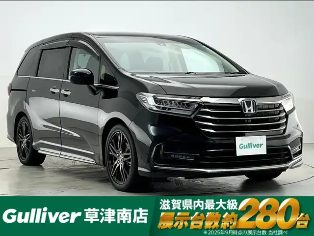 ホンダ オデッセイ ハイブリッド e:HEVアブソルート EX 滋賀県 2021(令3)年 3.6万km プレミアムスパークルブラックパール 純正10インチナビ/・Bluetooth・フルセグTV・DVD・CD・applecarplay/・androidAuto/全方位カメラ/後席フリップダウンモニター/ハーフレザーシート/運転席・助手席シートヒーター/ブラインドスポットモニター/コーナーセンサー/ドライブレコーダー/ビルトインETC2.0/両側パワースライドドア/Bluetooth/フルセグTV/applecarplay/androidAuto