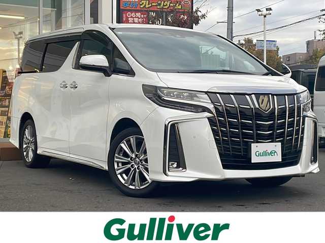トヨタ アルファード S タイプゴールド 道央・札幌 2020(令2)年 8.5万km ホワイトパールクリスタルシャイン ・４WD/・衝突軽減ブレーキ/・純正ナビ/　CD＆DVD＆BT＆TV/・バックカメラ/・ハーフレザーシート/・コーナーセンサー/・レーンキープアシスト/・レーダークルーズコントロール/・デジタルインナーミラー/・ブラインドスポットモニター/・フリップダウンモニター/・両側パワースライドドア/・パワーバックドア/・アイドリングストップ/・前後ドライブレコーダー/・MT付きAT/・ビルトインETC/・オートエアコン/・オートライト/・オートリトラミラー/・三眼LEDヘッドライト/・プッシュスタート/・スマートキー/・純正フロアマット/・ウィンカーミラー/・フォグライト/・スペアキー