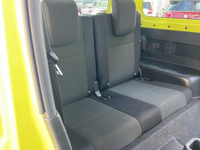 スズキ ジムニー XC 岐阜県 2022(令4)年 1.8万km キネティックイエロー 社外ナビ（CMOS-230）/AM/FM/Bluetooth/TV（フルセグ）/iPad/HDMI/純正マット/純正タイヤ/電動格納ミラー/クルコン/横滑り防止/ダウンヒルアシストコントロール/アイドリングストップ/衝突軽減ブレーキ/車線逸脱警報/シートヒーター/ビルトインETC/オートエアコン/オートライト/スマートキー/スペアキー/プッシュスタート/取扱説明書/保証書