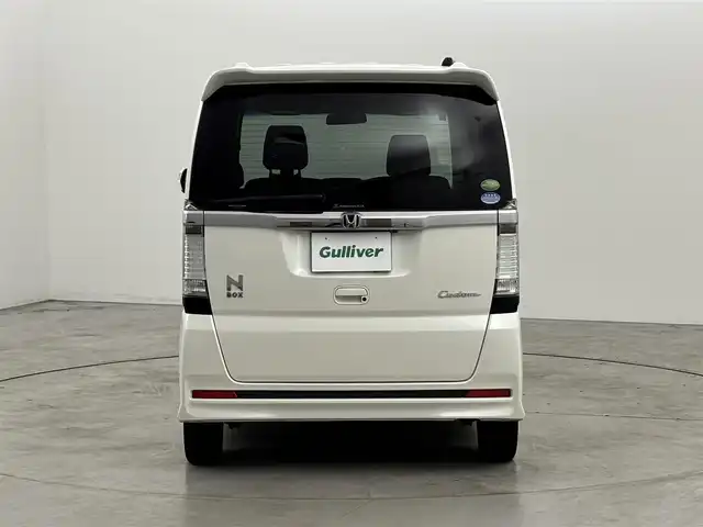 ホンダ Ｎ ＢＯＸ カスタム G SSパッケージ 福岡県 2013(平25)年 9.3万km プレミアムホワイトパール 社外ディスプレイオーディオ（ＢＴ）　/バックカメラ　/両側電動スライドドア　/横滑り防止装置　/ＥＣＯＮ　/プッシュスタート　/電動格納式ドアミラー　/純正フロアマット　/オートライト　/純正１４インチアルミホイール