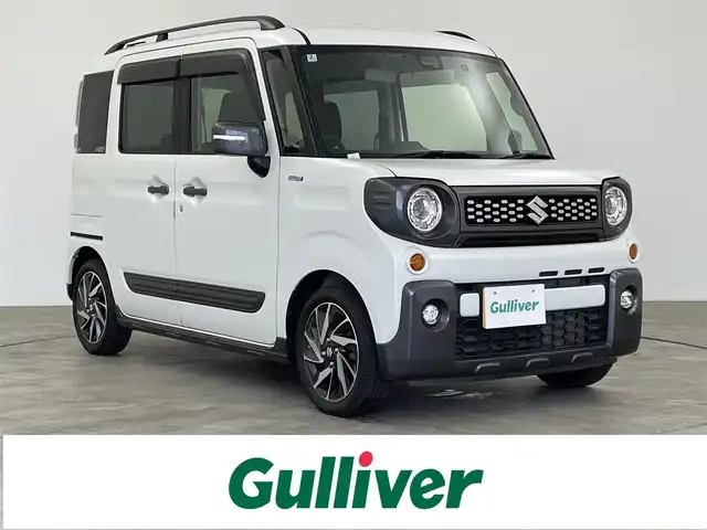 スズキ スペーシア ギア HYBRID XZターボ 大分県 2019(令1)年 6.6万km ピュアホワイトP 純正ナビ/Bluetooth接続可、フルセグTV、CD、DVD再生機能有/ドライブレコーダー/ビルトインETC/バックカメラ/両側パワースライド/シートヒーター/クルーズコントロール/パドルシフト/MTモード付AT/レーンキープアシスト/コーナーセンサー前後/横滑り防止装置/オートライト/衝突被害軽減システム/盗難防止装置/ルーフレール/純正フロアマット/純正アルミホイール/WAC/アイドリングストップ/LEDヘッドライト/Wエアバッグ/スマートキー