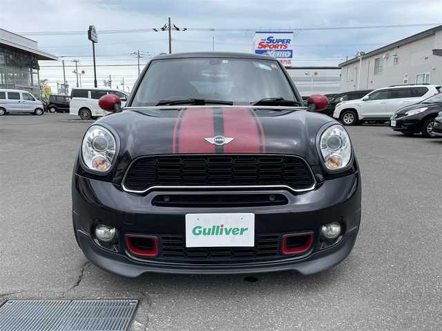 ＭＩＮＩ ミニ クロスオーバー クーパー S 道央・札幌 2012(平24)年 8万km アブソルートブラックM 登録時走行距離79115ｋｍ/社外メモリナビ（CD/DVD/FM/AM/SD/BT）/フルセグTV(走行中視聴可能)/バックカメラ/プッシュスタート/ETC/MTモード付AT/スペアキー×１/純正フロアマット/ルーフレール/横滑り防止装置/フォグランプ/リアフォグランプ/SPORTスイッチ/革巻きステアリング/パドルシフト/フロントデアイサースイッチ/電動格納ミラー/バニティミラー