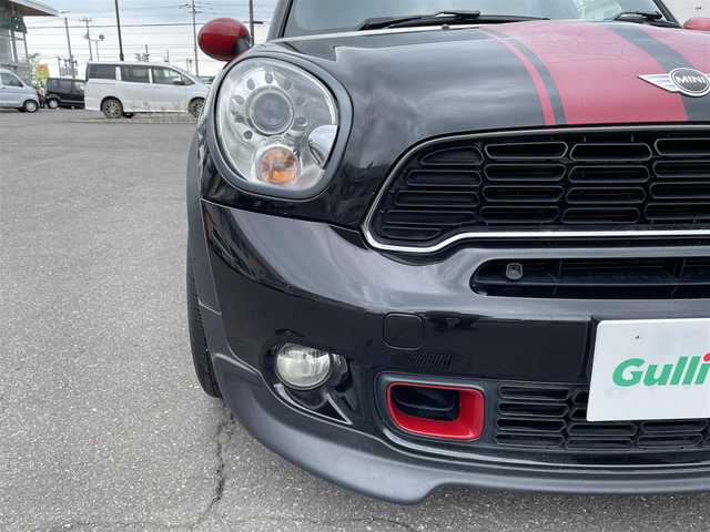 ＭＩＮＩ ミニ クロスオーバー クーパー S 道央・札幌 2012(平24)年 8万km アブソルートブラックM 登録時走行距離79115ｋｍ/社外メモリナビ（CD/DVD/FM/AM/SD/BT）/フルセグTV(走行中視聴可能)/バックカメラ/プッシュスタート/ETC/MTモード付AT/スペアキー×１/純正フロアマット/ルーフレール/横滑り防止装置/フォグランプ/リアフォグランプ/SPORTスイッチ/革巻きステアリング/パドルシフト/フロントデアイサースイッチ/電動格納ミラー/バニティミラー