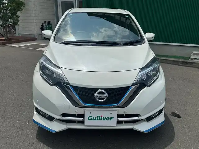 日産 ノート e－パワー メダリスト 宮城県 2016(平28)年 9.5万km ブリリアントホワイトパール エマージェンシーブレーキサポート/純正SDナビ/【CD・DVD・SD・BT・フルセグTV】/アラウンドビューモニター/純正エアロ/純正15インチAW/DriveMODE/レーンキープアラート/横滑り防止装置/ステアリングスイッチ/ウィンカーミラー/オートライト/LEDヘッドライト/フォグライト/スマートキー/ETC/フロアマット/ドアバイザー