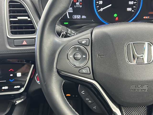 ホンダ ヴェゼル ハイブリッド Z ホンダセンシング 宮城県 2020(令2)年 2.5万km プラチナホワイトパール 禁煙車/Honda SENSING			/・衝突軽減ブレーキ			/・路外逸脱抑制機能					/・アダプティブクルーズコントロール			/・車線維持支援システム			/純正９型ナビ/・CD.DVD.SD.USB.BT.HDMI/フルセグTV/バックカメラ/ドライブレコーダー(前後)/ハーフレザーシート/前席シートヒーター/革巻ステアリング/ステアリングスイッチ/パドルシフト/プッシュスタート/スマートキー/純正17inAW/純正フロアマット/ＬＥＤヘッドライト/ＬＥＤフォグランプ/ビルトインＥＴＣ/横滑り防止機能/ドアバイザー/アイドリングストップ