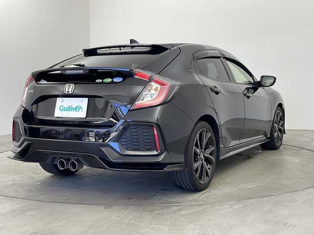 ホンダ シビック ハッチバック 兵庫県 2018(平30)年 5万km クリスタルブラックパール ・Honda SENSING/・衝突軽減ブレーキ〈CMBS〉/・渋滞追従機能付ACC〈アダプティブ・クルーズ・コントロール〉/・LKAS〈車線維持支援システム〉/・路外逸脱抑制機能/・オートハイビーム/・標識認識機能/・アジャイルハンドリングアシスト/・VSA/・EBD（電子制御制動力配分システム）付ABS/・デュアルピニオンアシストEPS/・LEDヘッドライト/・ナビ装着用スペシャルパッケージ/・ETC車載器/・純正ナビ/CD/DVD/TV/BT/・バックカメラ/・純正18インチアルミホイール/・前席シートヒーター/・パドルシフト/・アイドリングストップ