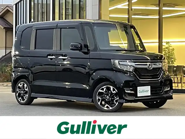ホンダ Ｎ ＢＯＸ カスタム G L ターボ ホンダセンシング 東京都 2018(平30)年 5.3万km クリスタルブラックパール 社外ナビ(NR-MZ077)/【DISC/MSV/SD/FM/AM/TV/BT/ipod/USB】/バックカメラ/ビルトインETC/ドライブレコーダー/アダプティブクルーズコントロール/両側電動スライドドア/ハーフレザーシート/LEDヘッドライト/フォグランプ/USBポート/後席サンシェード/バックソナー/衝突軽減ブレーキ/LKAS/純正15インチAW/純正フロアマット/スマートキー/プッシュスタート