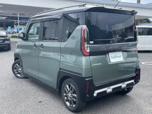 三菱 デリカミニ T プレミアム 鹿児島県 2024(令6)年 1.2万km 緑Ⅱ ワンオーナー/プッシュスタート/純正ナビ(FM/AM/BT/フルセグTV)/マイパイロット/パドルシフト/IC付ターボ/アイドリングストップ/ブレーキホールド/両側パワースライドドア/ビルトインETC/全方位カメラ/デジタルインナーミラー/ハーフレザーシート/DN席シートヒーター/純正フロアマット/純正アルミホイール/ルーフレール/オートライト/オートマチックハイビーム/ABS/ASC/HDC/DAA/FCM/LDW/LDP/TSR/LCDN/EAPM/ABSA/RCTA/PFCW/前後コーナーセンサー/スマートキー/取扱説明書/保証書