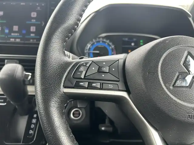 三菱 デリカミニ T プレミアム 鹿児島県 2024(令6)年 1.2万km 緑Ⅱ ワンオーナー/プッシュスタート/純正ナビ(FM/AM/BT/フルセグTV)/マイパイロット/パドルシフト/IC付ターボ/アイドリングストップ/ブレーキホールド/両側パワースライドドア/ビルトインETC/全方位カメラ/デジタルインナーミラー/ハーフレザーシート/DN席シートヒーター/純正フロアマット/純正アルミホイール/ルーフレール/オートライト/オートマチックハイビーム/ABS/ASC/HDC/DAA/FCM/LDW/LDP/TSR/LCDN/EAPM/ABSA/RCTA/PFCW/前後コーナーセンサー/スマートキー/取扱説明書/保証書