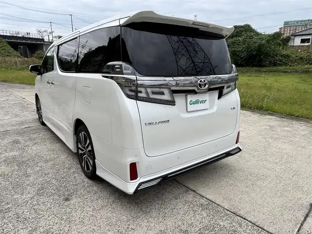トヨタ ヴェルファイア ZG 長崎県 2019(平31)年 8.3万km ホワイトパールクリスタルシャイン ワンオーナー/TRDエアロ（F/S/R下）/サンルーフ/社外11インチナビ/（CD/DVD/BT/フルセグ）/フリップダウンモニター/衝突軽減システム/レーンアシスト/ブラインドスポットモニター/両側パワースライドドア/パワーバックドア/デジタルインナーミラー/パワーシート/シートヒーター/エアシート/ハンドルヒーター/純正18インチAW