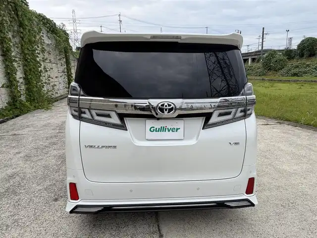 トヨタ ヴェルファイア ZG 長崎県 2019(平31)年 8.3万km ホワイトパールクリスタルシャイン ワンオーナー/TRDエアロ（F/S/R下）/サンルーフ/社外11インチナビ/（CD/DVD/BT/フルセグ）/フリップダウンモニター/衝突軽減システム/レーンアシスト/ブラインドスポットモニター/両側パワースライドドア/パワーバックドア/デジタルインナーミラー/パワーシート/シートヒーター/エアシート/ハンドルヒーター/純正18インチAW