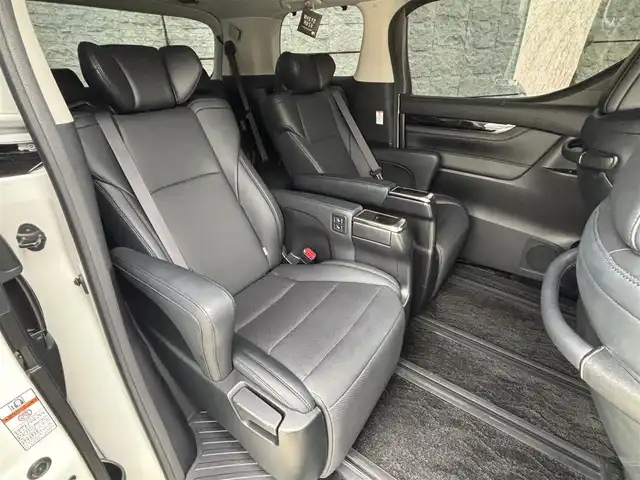 トヨタ ヴェルファイア ZG 長崎県 2019(平31)年 8.3万km ホワイトパールクリスタルシャイン ワンオーナー/TRDエアロ（F/S/R下）/サンルーフ/社外11インチナビ/（CD/DVD/BT/フルセグ）/フリップダウンモニター/衝突軽減システム/レーンアシスト/ブラインドスポットモニター/両側パワースライドドア/パワーバックドア/デジタルインナーミラー/パワーシート/シートヒーター/エアシート/ハンドルヒーター/純正18インチAW