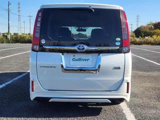 トヨタ エスクァイア ハイブリッド Gi 群馬県 2015(平27)年 7.1万km ホワイトパールクリスタルシャイン モデリスタエアロ(F/S/R)/純正9型ナビ/フルセグTV/純正11型後席ディスプレイ/両側パワースライドドア/バックモニター/ビルトインETC/ドライブレコーダー/クルーズコントロール/クリアランスソナー/LEDヘッドランプ/オートライト/デュアルオートエアコン/木目調/革巻きコンビステアリング/ステアリングスイッチ/合皮シート/モデリスタ17インチアルミホイール/スマートキー/プッシュエンジンスタート/禁煙車