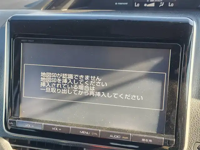 トヨタ エスクァイア ハイブリッド Gi 群馬県 2015(平27)年 7.1万km ホワイトパールクリスタルシャイン モデリスタエアロ(F/S/R)/純正9型ナビ/フルセグTV/純正11型後席ディスプレイ/両側パワースライドドア/バックモニター/ビルトインETC/ドライブレコーダー/クルーズコントロール/クリアランスソナー/LEDヘッドランプ/オートライト/デュアルオートエアコン/木目調/革巻きコンビステアリング/ステアリングスイッチ/合皮シート/モデリスタ17インチアルミホイール/スマートキー/プッシュエンジンスタート/禁煙車