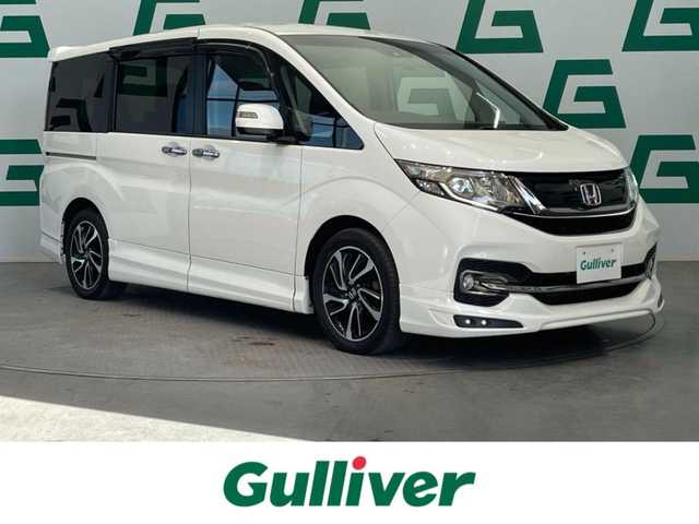 ホンダ ステップワゴン スパーダ クールスピリット ADV パッケージβ 鹿児島県 2016(平28)年 5.8万km ホワイトオーキッドパール 無限エアロ/純正9インチプレミアムインターナビ/フルセグTV/BT/CD/DVD/MSV/純正フリップダウンモニター/バックカメラ/両側パワースライドドア/レーダークルーズコントロール/ハーフレザーシート/前席シートヒーター/パドルシフト/わくわくゲート/ETC/純正LEDヘッドライト/純正17インチアルミホイール