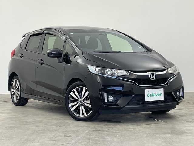 ホンダ フィット ハイブリット Sパッケージ 群馬県 2016(平28)年 5.2万km クリスタルブラックパール 禁煙車　衝突軽減ブレーキ　純正７インチナビ　バックカメラ　クルーズコントロール　LEDライト　純正１６インチアルミホイール　ステアリングリモコン　パドルシフト　ETC　ドライブレコーダー　スマートキー