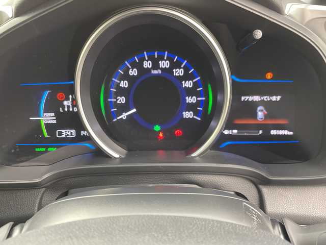 ホンダ フィット ハイブリット Sパッケージ 群馬県 2016(平28)年 5.2万km クリスタルブラックパール 禁煙車　衝突軽減ブレーキ　純正７インチナビ　バックカメラ　クルーズコントロール　LEDライト　純正１６インチアルミホイール　ステアリングリモコン　パドルシフト　ETC　ドライブレコーダー　スマートキー