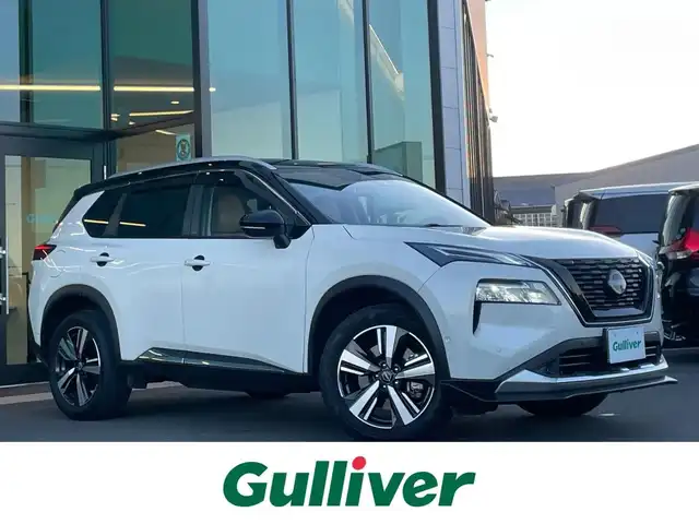 日産 エクストレイル G e－4ORCE 東京都 2023(令5)年 5.5万km ブリリアントホワイトパール/スーパーブラック 2トーン ワンオーナー/NISMOフロントリップスポイラー/NISMOスポーツマフラー/NISMOアンテナ・ピラー・バックドア・ウィングサイドガーニッシュ/純正ナビ/アラウンドビューカメラ/フルセグテレビ/Bluetooth/プロパイロット/ヘッドアップディスプレイ/インテリジェントルームミラー/ワイヤレスチャージ/ステアリングリモコン/ステアリングヒーター/シートヒーター/レザーシート/パワーシート/ETC2.0/前後コーナーセンサー/電動リアゲート/ルーフレール/リアフォグ/純正19インチアルミホイール/インテリジェントエマージェンシーブレーキ/インテリジェントクルーズコントロール/スペアキー