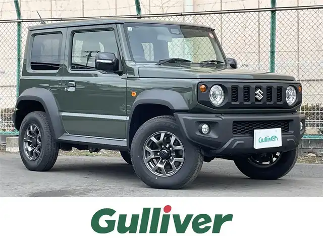 スズキ ジムニー シエラ JC 東京都 2025(令7)年 0.5万km ジャングルグリーン 社外ナビ　/Bluetooth　/フルセグTV　/FM　/AM　/シートヒーター　/クルーズコントロールシステム　/ステアリングスイッチ　/純正フロアマット　/純正アルミホイール　/純正LED　/ABS　/横滑り防止装置/レーンアシスト/オートライト/ダウンヒルアシストコントロールシステム/衝突被害軽減システム
