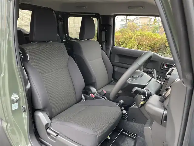 スズキ ジムニー シエラ JC 東京都 2025(令7)年 0.5万km ジャングルグリーン 社外ナビ　/Bluetooth　/フルセグTV　/FM　/AM　/シートヒーター　/クルーズコントロールシステム　/ステアリングスイッチ　/純正フロアマット　/純正アルミホイール　/純正LED　/ABS　/横滑り防止装置/レーンアシスト/オートライト/ダウンヒルアシストコントロールシステム/衝突被害軽減システム