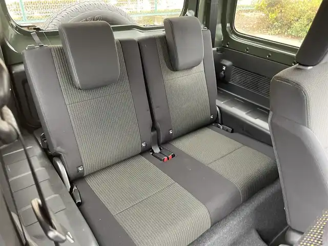 スズキ ジムニー シエラ JC 東京都 2025(令7)年 0.5万km ジャングルグリーン 社外ナビ　/Bluetooth　/フルセグTV　/FM　/AM　/シートヒーター　/クルーズコントロールシステム　/ステアリングスイッチ　/純正フロアマット　/純正アルミホイール　/純正LED　/ABS　/横滑り防止装置/レーンアシスト/オートライト/ダウンヒルアシストコントロールシステム/衝突被害軽減システム