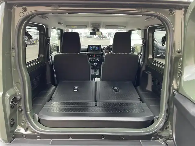 スズキ ジムニー シエラ JC 東京都 2025(令7)年 0.5万km ジャングルグリーン 社外ナビ　/Bluetooth　/フルセグTV　/FM　/AM　/シートヒーター　/クルーズコントロールシステム　/ステアリングスイッチ　/純正フロアマット　/純正アルミホイール　/純正LED　/ABS　/横滑り防止装置/レーンアシスト/オートライト/ダウンヒルアシストコントロールシステム/衝突被害軽減システム