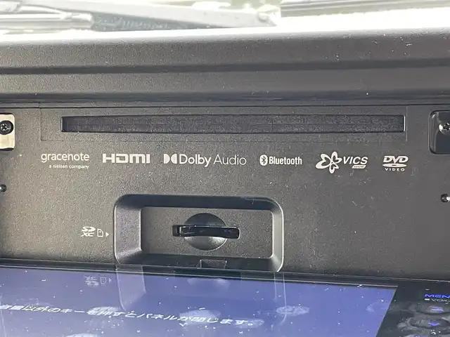 スズキ ジムニー シエラ JC 東京都 2025(令7)年 0.5万km ジャングルグリーン 社外ナビ　/Bluetooth　/フルセグTV　/FM　/AM　/シートヒーター　/クルーズコントロールシステム　/ステアリングスイッチ　/純正フロアマット　/純正アルミホイール　/純正LED　/ABS　/横滑り防止装置/レーンアシスト/オートライト/ダウンヒルアシストコントロールシステム/衝突被害軽減システム