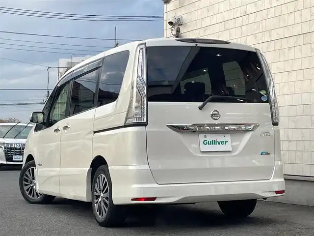 日産 セレナ ハイウェイスター Sハイブリッド 鹿児島県 2014(平26)年 9.6万km ブリリアントホワイトパール ワンオーナー/後期型/メーカーOP/8インチナビゲーション/フルセグTV/DVD/CD/Bluetooth/SD/USB/AUX/純正フリップダウンモニター/エマージェンシーブレーキ/車線逸脱警告/電動スライドドア/クルーズコントロール/バックカメラ/スマートキーx2/ETC/LEDヘッドライト/オートエアコン/リアオートエアコン/新車保証書/取扱説明書