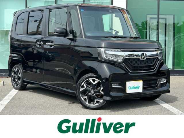 ホンダ Ｎ ＢＯＸ カスタム G L ターボ ホンダセンシング 和歌山県 2019(令1)年 5.7万km クリスタルブラックパール 社外7インチナビ（AVIC-RZ９１０）/フルセグTV/（BT/CD/DVD/AM/FM/USB/HDMI)/バックカメラ/横滑り防止/レーンキープアシスト/衝突被害軽減ブレーキ/オートライト/レーダークルーズコントロール/後方コーナーセンサー/両側パワスラ/ビルトインETC/前方ドラレコ/前席シートヒーター/パドルシフト/ステアリングリモコン/LEDヘッドライト/フォグランプ/後席サンシェード/純正15インチアルミ/社会マフラー