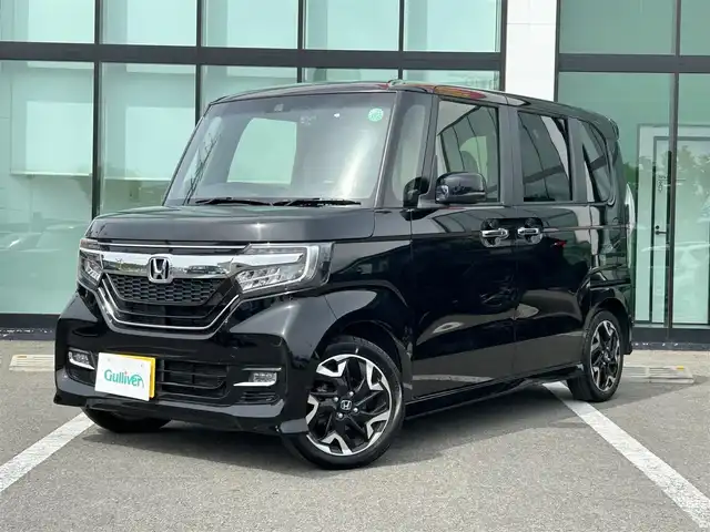 ホンダ Ｎ ＢＯＸ カスタム G L ターボ ホンダセンシング 和歌山県 2019(令1)年 5.7万km クリスタルブラックパール 社外7インチナビ（AVIC-RZ９１０）/フルセグTV/（BT/CD/DVD/AM/FM/USB/HDMI)/バックカメラ/横滑り防止/レーンキープアシスト/衝突被害軽減ブレーキ/オートライト/レーダークルーズコントロール/後方コーナーセンサー/両側パワスラ/ビルトインETC/前方ドラレコ/前席シートヒーター/パドルシフト/ステアリングリモコン/LEDヘッドライト/フォグランプ/後席サンシェード/純正15インチアルミ/社会マフラー