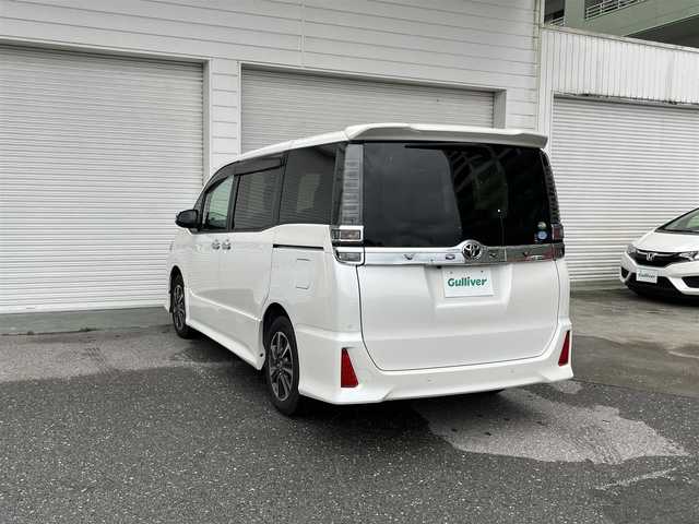 トヨタ ヴォクシー ZS 煌Ⅱ 高知県 2019(令1)年 2.7万km ホワイトパールクリスタルシャイン 純正ナビ/フルセグテレビ/バックカメラ/アイドリングストップ/クルーズコントロール/両側パワースライドドア/ETC2.0/Bluetooth接続/ドライブレコーダー/純正16インチアルミホイール/ABS/横滑り防止装置/コーナーセンサー/レーンキープアシスト/盗難防止装置/オートライト/衝突被害軽減システム