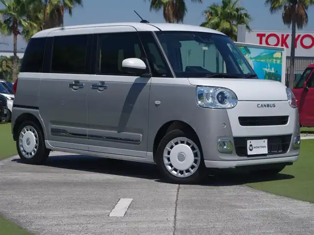 ダイハツ ムーヴ キャンバス ストライプス G 千葉県 2022(令4)年 3.8万km シャイニングホワイトパール/スムーズグレーマイカメタリック スマートアシストIII/エコアイドル/両側パワースライドドア/社外メモリーナビ/地デジTV/【DVD/CD再生機能　Bluetooth接続】/バックカメラ/ステアリングスイッチ/ETC/LEDヘッドライト/フォグライト/コーナーセンサー/サイド/カーテンエアバッグ/キーフリーシステム