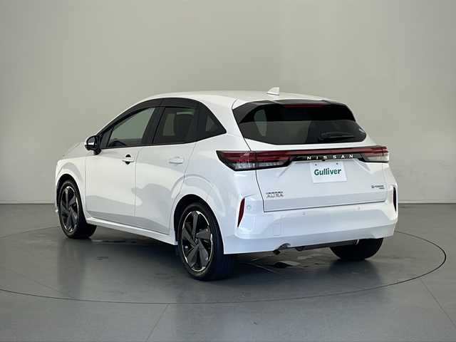 日産 オーラ G FOUR レザーエディション 長野県 2021(令3)年 2.9万km ブリリアントホワイトパール 4WD/BOSEプレミアムサウンド/デジタルインナーミラー/ブラインドスポットミラー/アラウンドビューモニター/アダクティブクルーズ/置くだけ充電/寒冷地仕様/ブラックレザーシート/ステアリングスイッチ/ビルトインETC/オートライト/オートハイビーム