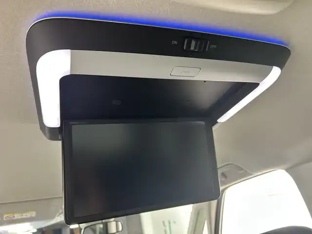 ホンダ ステップワゴン eHEV エアー EX 愛知県 2025(令7)年 0.1千km カジノホワイトパール 登録済未使用車/ターボ/純正11.4インチナビ/（CD/DVD/Bluetooth/フルセグTV/USB/SD)/バックカメラ/純正15.6インチフリップダウンモニター/ホンダセンシング/・衝突軽減ブレーキ/・レーンキープアシスト/・オートハイビーム/・ブラインドスポットモニター/・パーキングセンサー/・アダプティブクルーズコントロール/・誤発進抑制機能/シートヒーター/オットマン/両側パワースライドドア/パワーバックドア/パドルシフト/純正16インチアルミホイール/スマートキー/スペアキー1本/プッシュスタート/LEDヘッドライト/フロントフォグランプ/オートライト/横滑り防止装置/電子パーキングブレーキ/オートホールド/電動格納ミラー