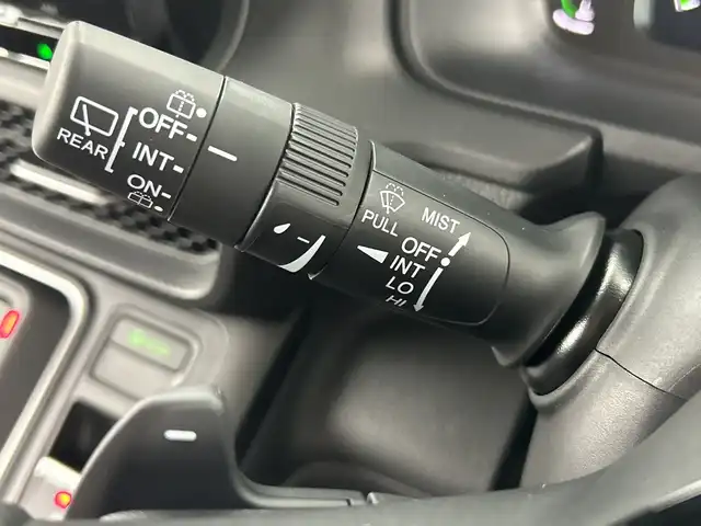 ホンダ ステップワゴン eHEV エアー EX 愛知県 2025(令7)年 0.1千km カジノホワイトパール 登録済未使用車/ターボ/純正11.4インチナビ/（CD/DVD/Bluetooth/フルセグTV/USB/SD)/バックカメラ/純正15.6インチフリップダウンモニター/ホンダセンシング/・衝突軽減ブレーキ/・レーンキープアシスト/・オートハイビーム/・ブラインドスポットモニター/・パーキングセンサー/・アダプティブクルーズコントロール/・誤発進抑制機能/シートヒーター/オットマン/両側パワースライドドア/パワーバックドア/パドルシフト/純正16インチアルミホイール/スマートキー/スペアキー1本/プッシュスタート/LEDヘッドライト/フロントフォグランプ/オートライト/横滑り防止装置/電子パーキングブレーキ/オートホールド/電動格納ミラー