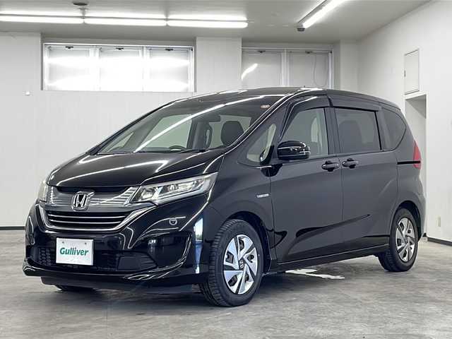 ホンダ フリード ハイブリット G ホンダセンシング 長崎県 2017(平29)年 6万km 黒 純正9インチメモリナビVXM-175VFNi/（フルセグ/Apple CarPlay/CD/DVD/BTA）/バックカメラ/フリップダウンモニター/ホンダセンシング/・アクティブクルーズコントロール/・衝突軽減ブレーキ/・車線維持支援システム/・歩行者事故低減ステアリング/・路外逸脱抑制機能/・先行車発進お知らせ機能/・標識認識機能/両側パワースライドドア/LEDヘッドライト/ドライブレコーダー/ETC/レザー調シートカバー/純正フロアマット/オートライト/プッシュスタート/ウォークスルー/盗難防止装置/ドアバイザー