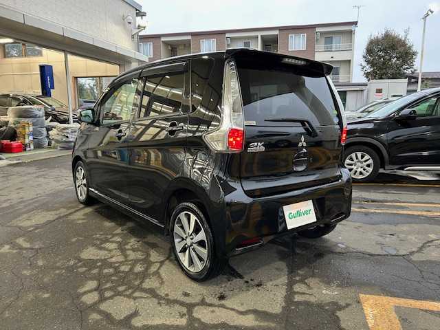 三菱 ｅＫカスタム T 道東・釧路十勝 2013(平25)年 5.7万km アメジストブラック 4WD/純正メモリーナビ/  (CD/フルセグTV)/バックカメラ/シートヒーター/HIDヘッドライト/フォグライト/ウィンカーミラー/電動格納ミラー/革巻きステアリング/純正フロアマット/純正ドアバイザー/スマートキー/エンジンプッシュスタート/純正15インチアルミホイール/冬タイヤ積み込み/  (155/65R14、7mm、2024年製、社外AW)