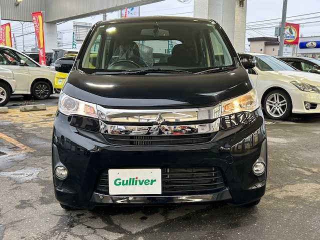 三菱 ｅＫカスタム T 道東・釧路十勝 2013(平25)年 5.7万km アメジストブラック 4WD/純正メモリーナビ/  (CD/フルセグTV)/バックカメラ/シートヒーター/HIDヘッドライト/フォグライト/ウィンカーミラー/電動格納ミラー/革巻きステアリング/純正フロアマット/純正ドアバイザー/スマートキー/エンジンプッシュスタート/純正15インチアルミホイール/冬タイヤ積み込み/  (155/65R14、7mm、2024年製、社外AW)