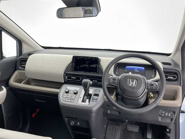 ホンダ フリード AIR EX 長野県 2025(令7)年 0.1千km フィヨルドミストパール 4WD/登録済未使用車/USB入力端子/寒冷地仕様/クルーズコントロール（追従あり）/レーンキープアシスト/横滑り防止装置/パーキングセンサー警報/踏み間違い衝突軽減システム/路外逸脱抑制機能/ステアリングスイッチ/3列シート/ウォークスルー/シートヒーター（前席）/両側パワースライドドア/カーテンエアバック/電格ミラー/LEDヘッドライト/オートライト/BSM/純正15インチ夏タイヤ/スマートキー/スペアキー1本